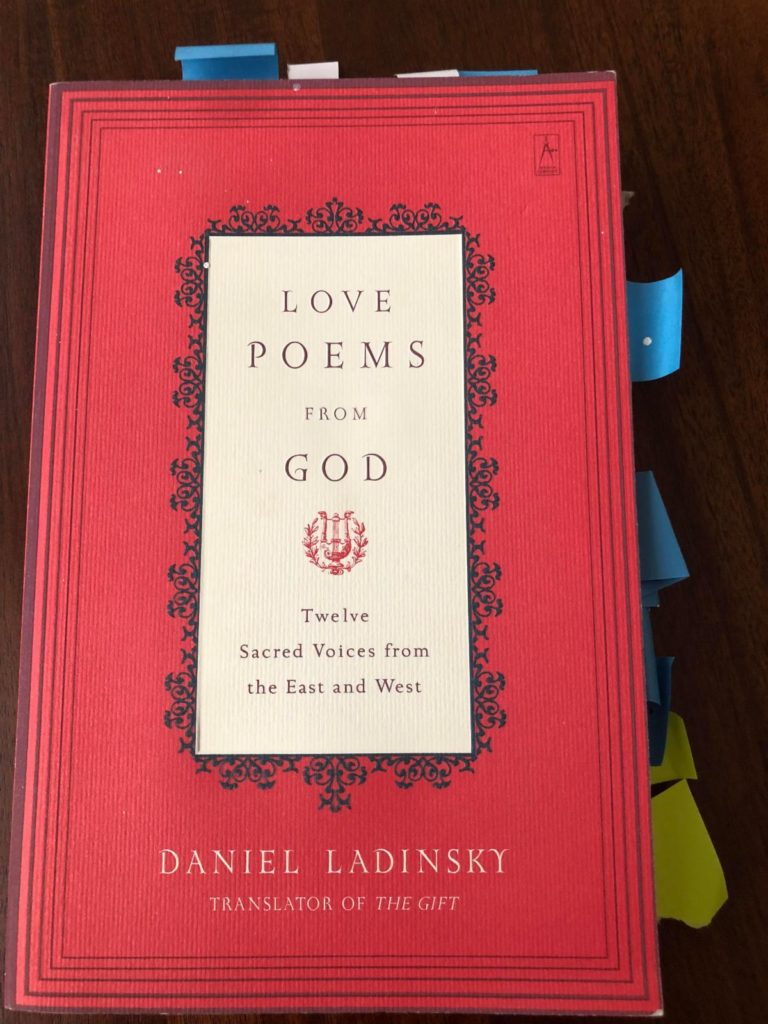Red cover book with the title "Love Poems From God" by Daniel Ladinsky